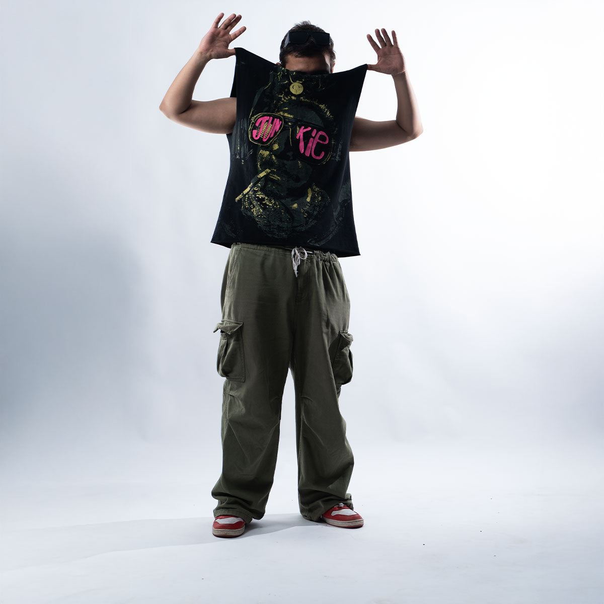 Front view Frappe Ash wearing black JUNKIE vest